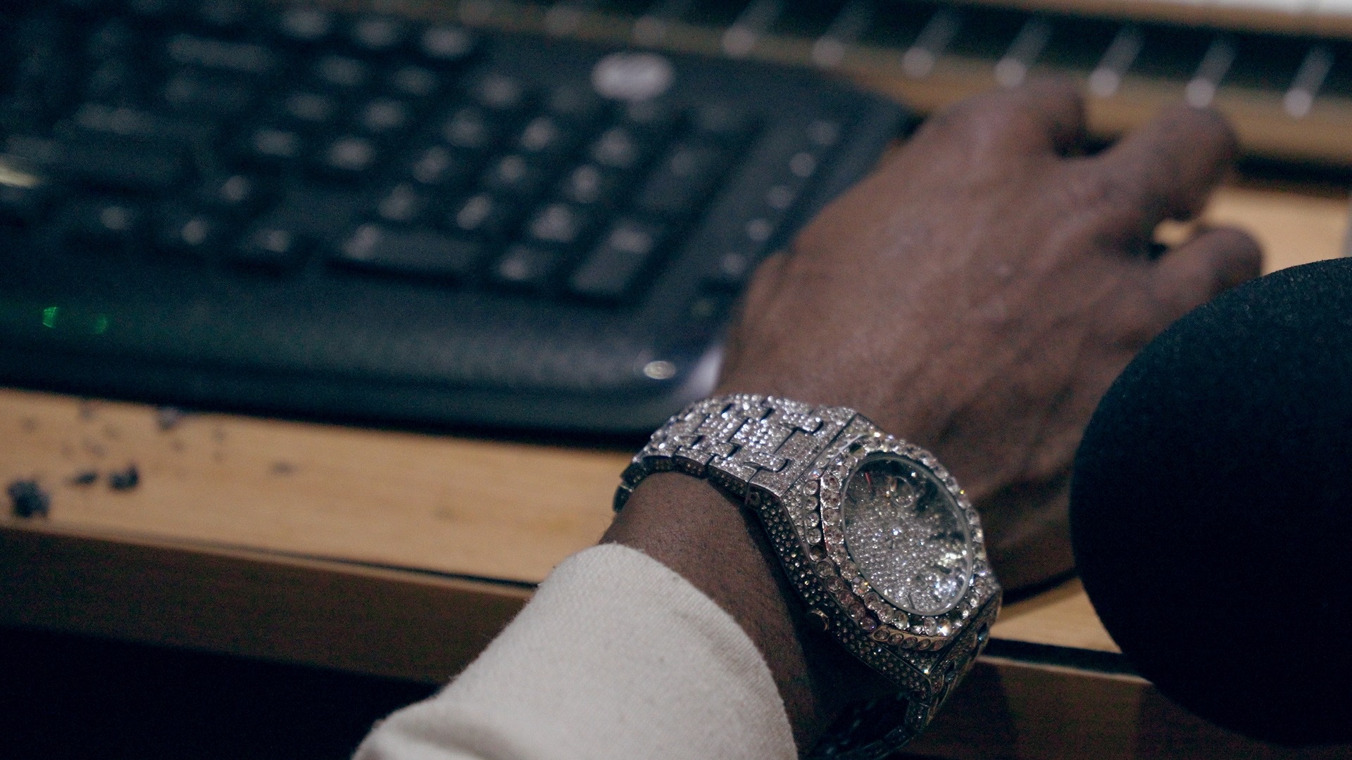Close-up of a watch at the studio console
